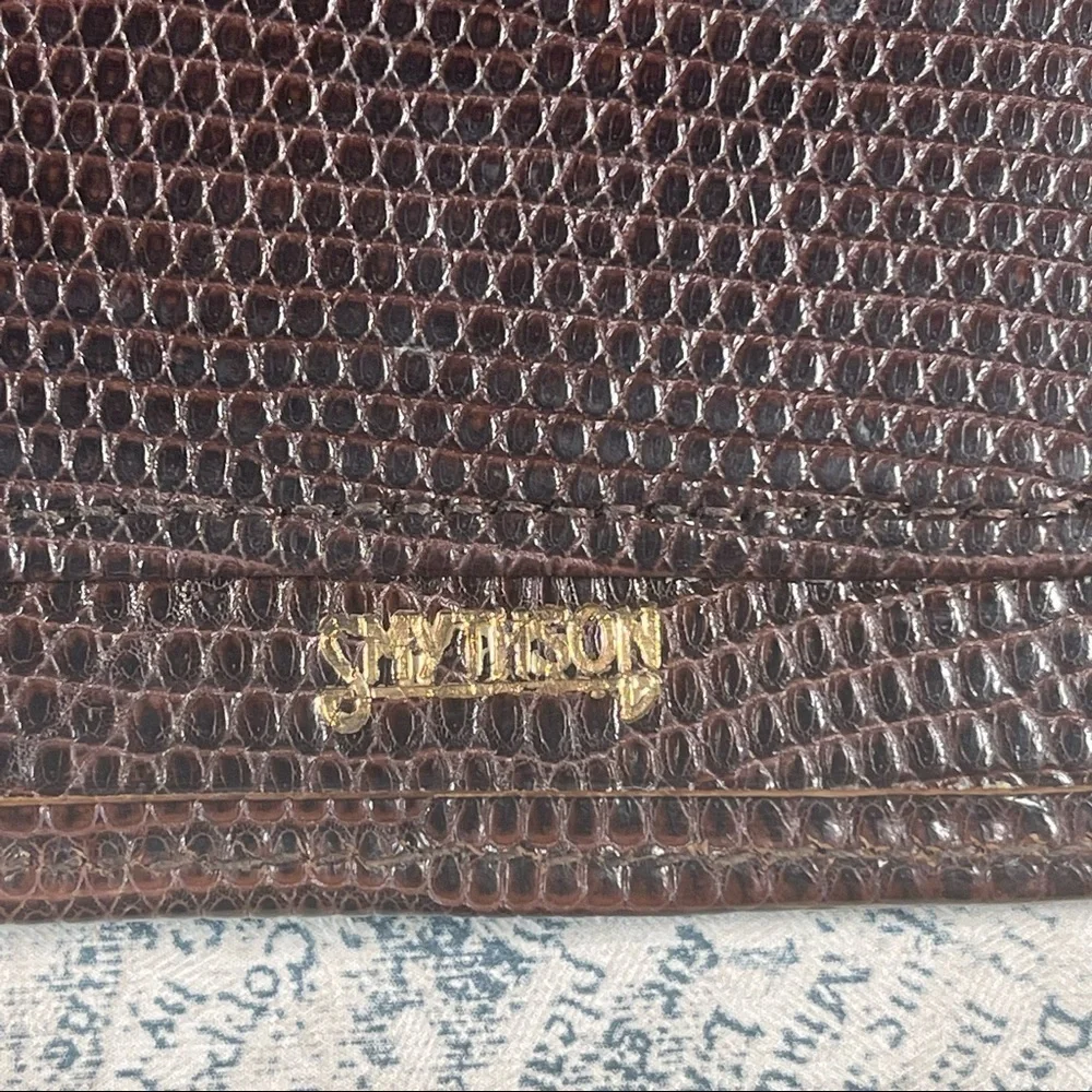 Smythson Antique lizard skin passport wallet with gold corners